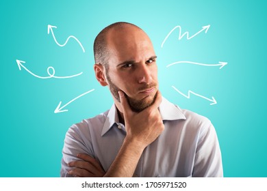 Confused And Pensive Man Thinks About The Best Way Forward