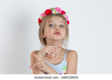 Confused Puzzled Young Girl, Kid Pointing In Two Different Directions Not Sure Which Way To Go In Life Isolated On White Background