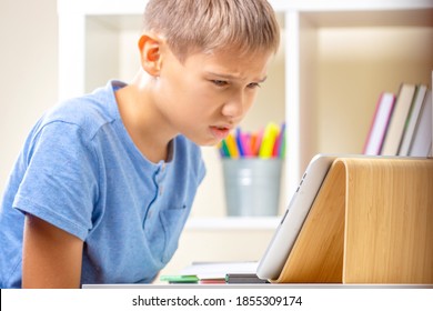 Confused Upset Teenage Boy Stuck With Homework. Kid Having Learning Problem. Learning Difficulties, Online Education Concept