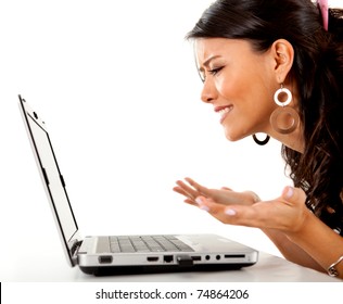 Confused Woman Working On A Laptop Computer - Isolated Over White