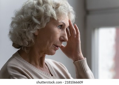 Confused worried old lady suffering from age disorders, Alzheimer disease, headache. Concerned pensive senior 70s woman feeling anxiety, losing memory, having mental disease symptoms. Close up - Powered by Shutterstock