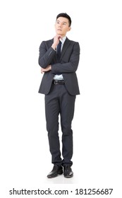 Confused Young Business Man Standing And Thinking, Full Length Portrait Isolated On White Background.