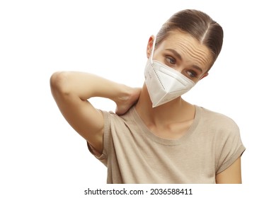 Confused Young Woman Wearing Medical Face Mask Isolated On White Background