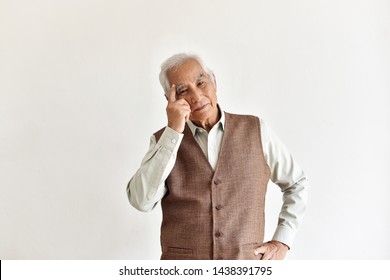 Confusing And Forgetful Elderly Asian Man With Thinking Gesture, Alzheimer's Disease, Dementia Cognitive Brain Problem In Old Pensioner, Senior Healthcare Concept.