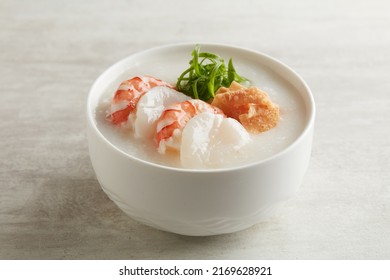 Congee With Scallop Prawn Served In A Dish Isolated On Grey Background