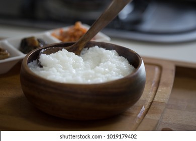 Congee is a type of rice porridge or gruel popular in many Asian countries.Rice porridge in wooden bowl.