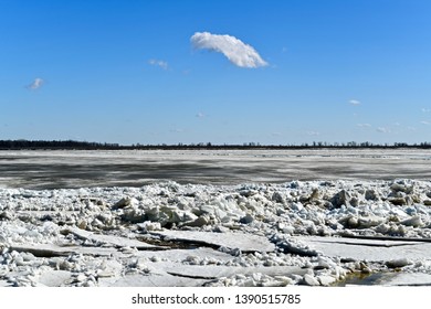 Congestion On The River In The Spring. A Large Cluster Of Moving Ice Blocks.