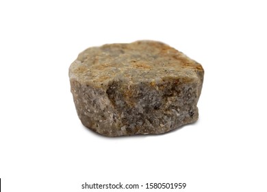 Conglomerate rock isolated on white background. Conglomerate is a clastic sedimentary rock that contains large  rounded clasts. There is noise and grain caused by the texture of the stone. - Shutterstock ID 1580501959