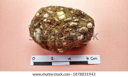 Conglomerate are sedimentary rocks consisting of quartz, red limestone, sand with fragments made and rounded half, geological consep for rock and minerals description. Ophiolite area and melange zone