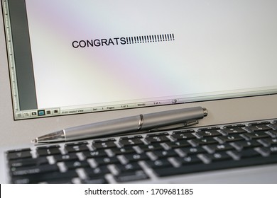 Congrats, typed words on the computer screen. Good news on new job or promotion concept.