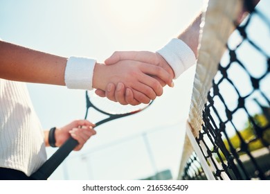 Congratulations Champ. Cropped Shot Of Two Unrecognizable Tennis Players Shaking Together Outdoors On The Court.