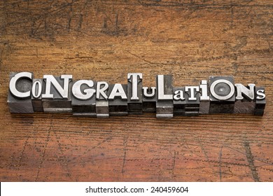 Congratulations  Word In Mixed Vintage Metal Type Printing Blocks Over Grunge Wood