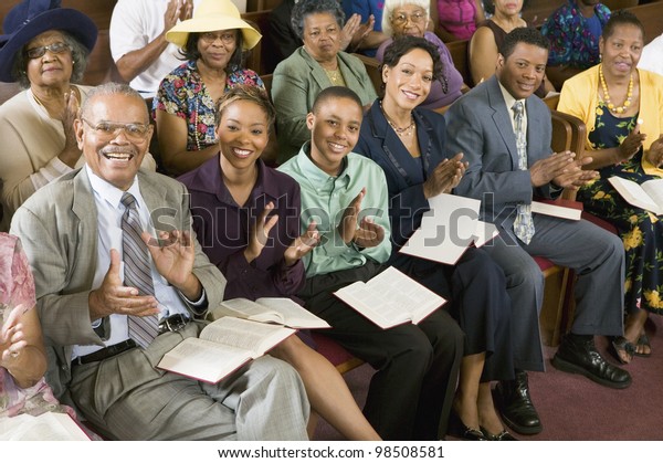 Congregation Clapping at\
Church