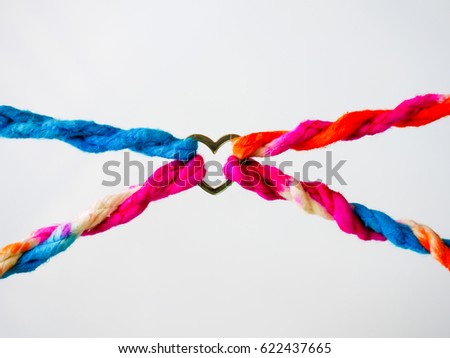 Connected group concept as many different ropes tied and linked together as an unbreakable chain as a community trust and faith metaphor and learning