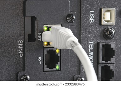Connecting an Ethernet switch using patch cords with RJ45 connectors for data transmission in the data center