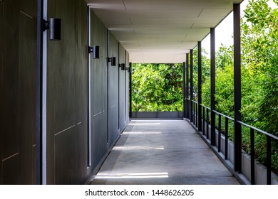 The connecting  path between the open -air building that can touch nature.
