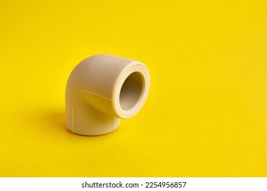 The connection angle of the thermoplastic pipe at an angle of 90 degrees. Concept of installation of water supply and sewage systems. - Shutterstock ID 2254956857