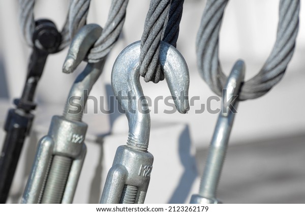 Connection and fastening of iron cables with a\
steel turnbuckles. Selective\
focus.