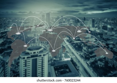 connection and network system concept over blurred cityscape, green tone process