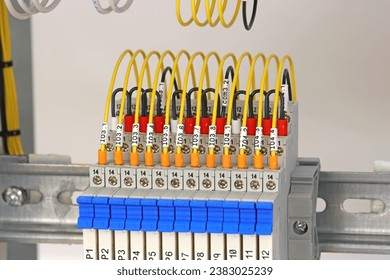 Connection of the slim intermediate relay using copper insulated mounting wires in color insulation.