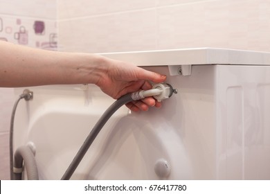 Connection of the washing machine to the water supply.