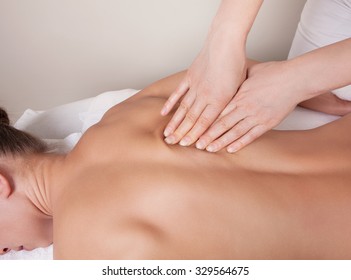 Connective Tissue Massage On  A Muscle Group (erector Spinae Muscles) Of A Woman's Back  