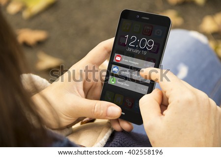 connectivity concept: woman holding a 3d generated smartphone with notifications on the screen. Graphics on screen are made up.