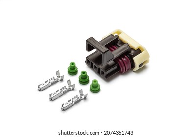 Connector for wiring. Spare part of the engine electrical system. Three-pin electrical connector isolated on white background