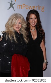 Connie Stevens And Joely Fisher  At The Global Action Awards Gala, Beverly Hilton Hotel, Beverly Hills, CA. 02-18-11