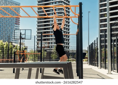 Conquering the monkey bars outdoor fitness in the heart of the city, where movement meets motivation.