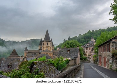 Conques, Midi Pyrenees, France - June 12, 2015:View to Abbey of Saint-Foy at Conques, France - Shutterstock ID 1221887671