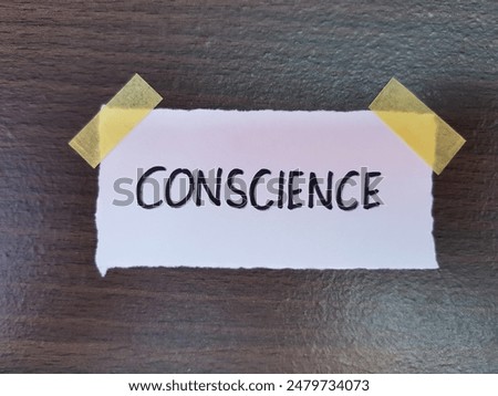 Conscience writting on table background.