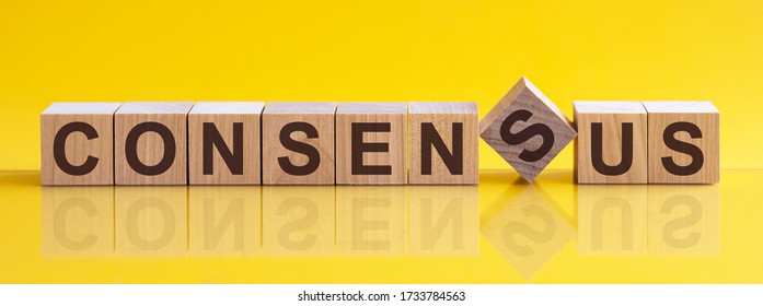 CONSENSUS Word Made With Building Blocks On The Bright Yellow Background.