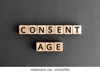 Consent Age - Word From Wooden Blocks With Letters, Sexual Education Age Of Consent Concept,  Top View On Grey Background