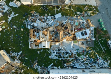 Consequences of natural disaster in southern Florida after hurricane season. Severely damaged houses in mobile home residential area - Powered by Shutterstock