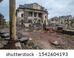 The consequences of the war. Postwar devastation. City after a missile strike. The remains of destroyed buildings. Residential area of the city after the bombing. Panorama of the city after the war.