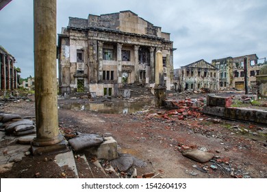 The consequences of the war. Postwar devastation. City after a missile strike. The remains of destroyed buildings. Residential area of the city after the bombing. Panorama of the city after the war.