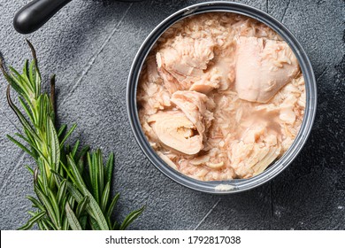 Conserved Tuna Open Can With Fresh Herbs Garlic And Lemon Ingredients For Preservs Top View Close Up