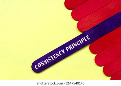 Consistency Principle Text On Purple Color Wooden Stick. Business And Accounting Concept.