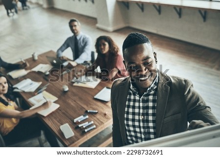 Consistent action creates consistent results. a well-dressed businessman giving a presentation to his colleagues in the office.
