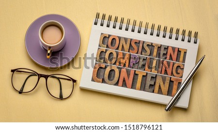 consistent, compelling content -  recommendation for creativity, bloging and social media marketing - a word abstract in vintage letterpress wood type in a notebook, flat lay with coffee and glasses