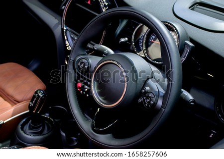 Console luxury car with the steering wheel