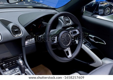 Console luxury super car with the steering wheel