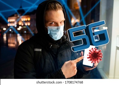 Conspiracy Theory Correlation Between 5G Mobile Networks And Coronavirus , Teenager With Mask Holding Phone 