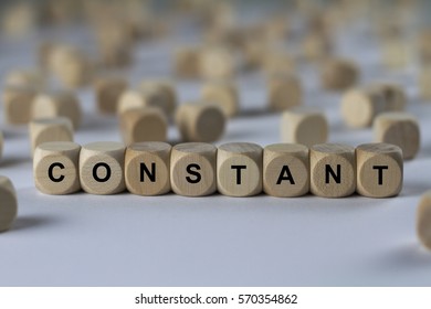constant - cube with letters, sign with wooden cubes - Shutterstock ID 570354862
