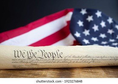 Constition of the USA with US flag - Shutterstock ID 1923276848