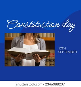 Constitution day text in white on blue and midsection of biracial female attorney holding book. American constitution and federal government law celebration day digitally generated image. - Powered by Shutterstock