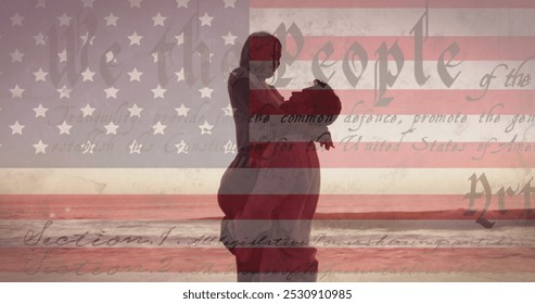 Constitution text over american flag against couple embracing each other at the beach. american independence patriotic holiday concept - Powered by Shutterstock