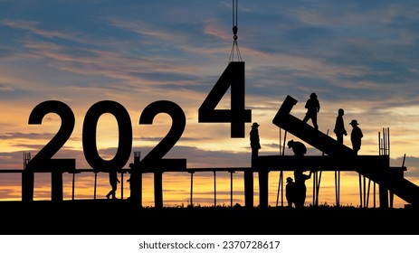 Construction 2024 concept ,Silhouette of staff as a team to prepare to welcome the 2024.Happy New Year 2024