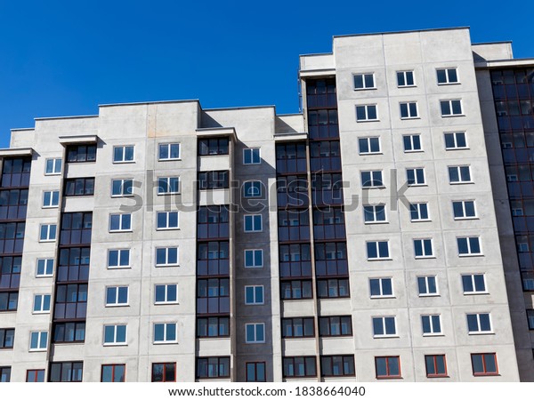 construction of apartment buildings for housing a\
large number of people and families in a provincial city in Eastern\
Europe, modern multi-storey buildings with all communal amenities\
and good living